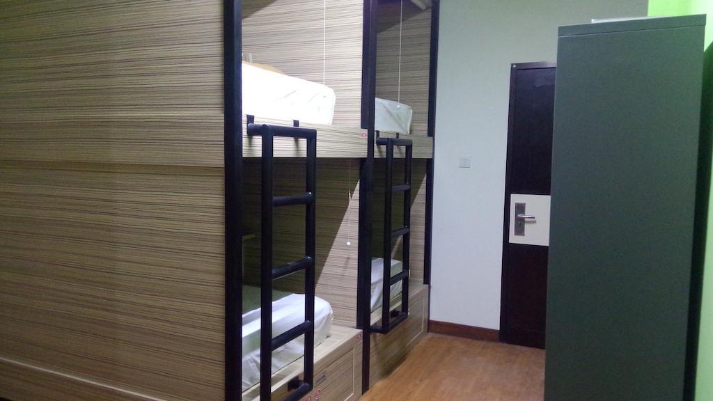 Cx Hostel Kuta Raya Pokoj fotografie