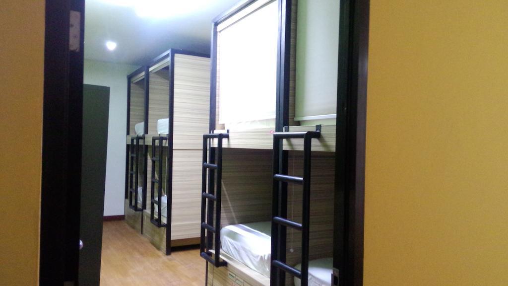 Cx Hostel Kuta Raya Pokoj fotografie