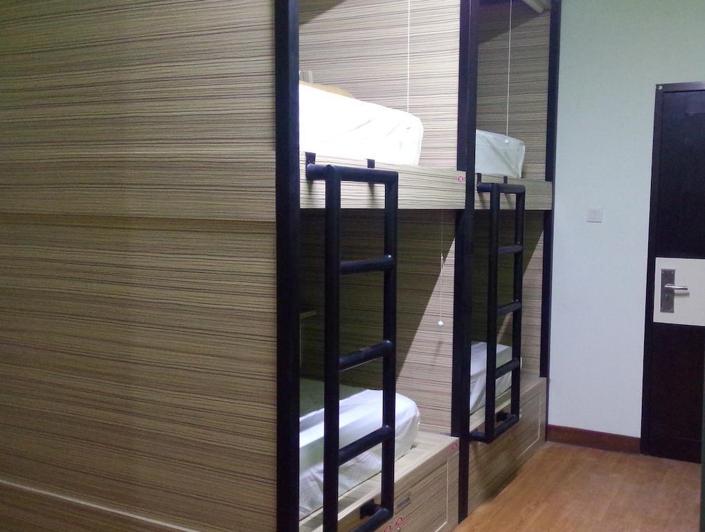 Cx Hostel Kuta Raya Pokoj fotografie